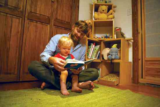 
In the nursery, an organic cotton Prairie Rug (prairierugs.com) next to storage cubes made of recycled paper from Way Basics (waybasics.com) makes a good place for reading together.
